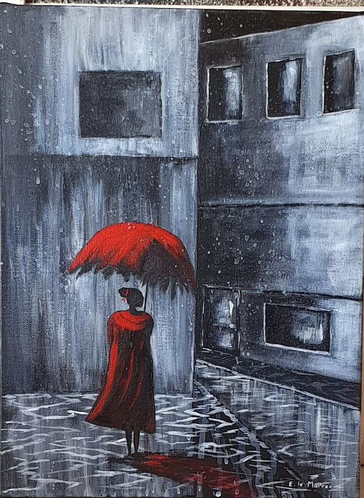 Dame en rouge sous la pluie